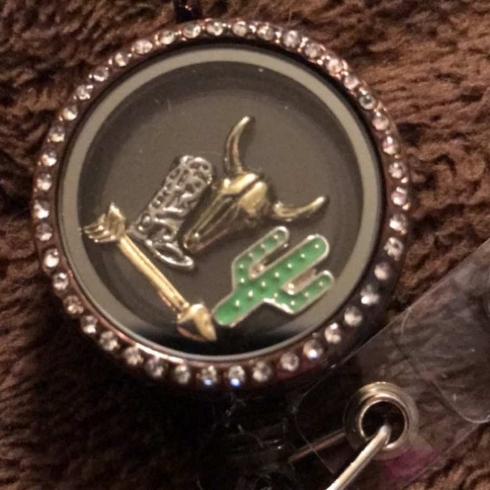 3/$75 Western locket badge reel